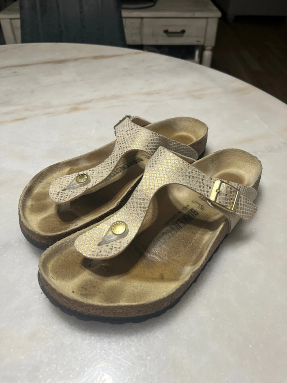 Gold Birkenstock sandals